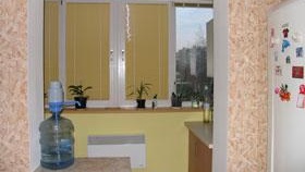 Разширение на кухнята поради снимката на балкона